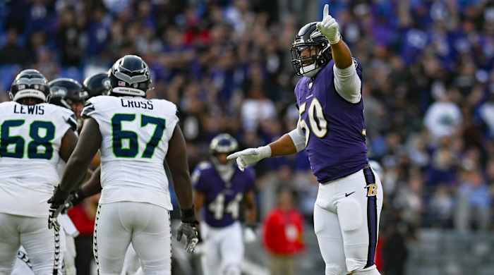 Ravens defensive end Kyle Van Noy celebrates a sack against the Seahawks